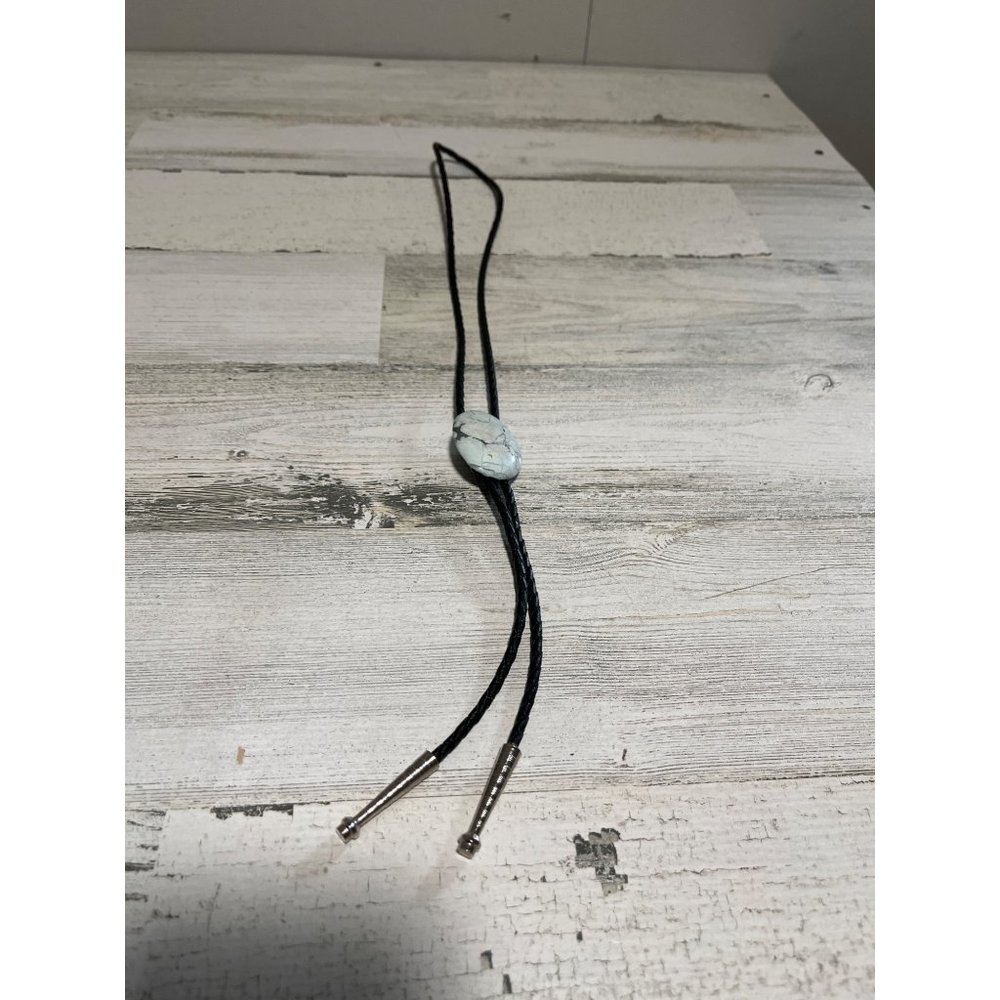 Marble type stone black leather bolo with silver ends